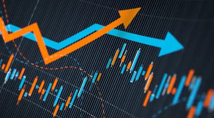Grafische weergave van statistische trends met blauwe en oranje pijlen, symbool voor groei en prestaties van professionele printers.